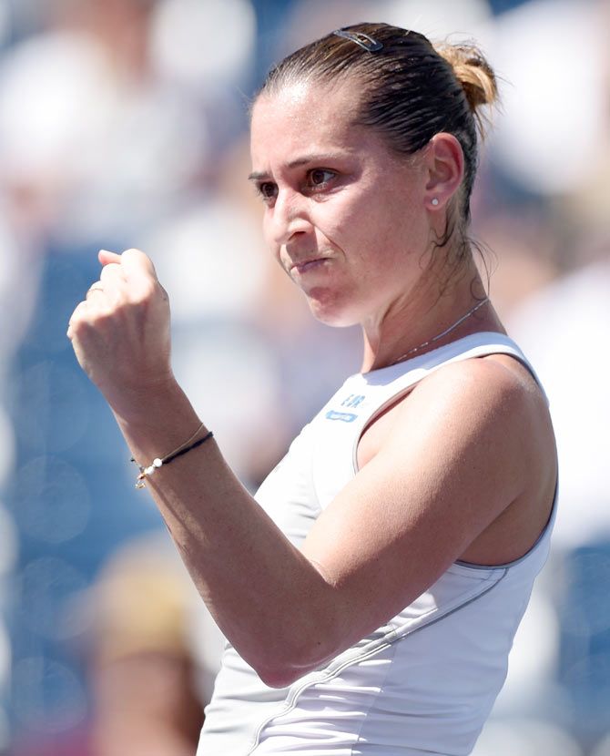 Flavia Pennetta celebrates match point in her victory over Madison Brengle