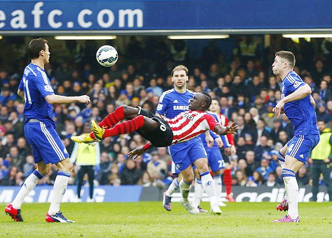 Southampton's Sadio Mane attempts the bicycle shot during their English Premier League match against Chelsea at Stamford Bridge on Sunday