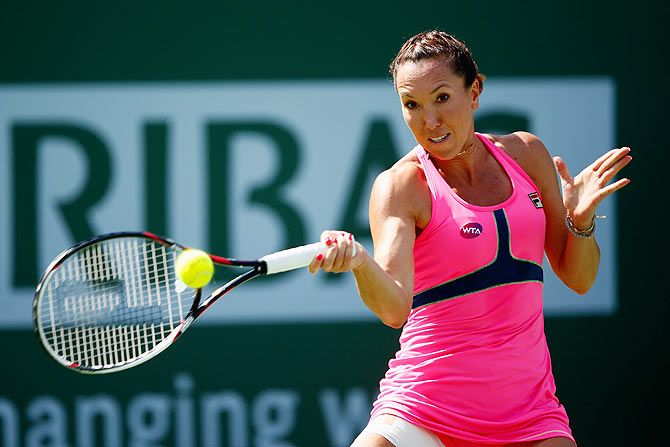 Serbia's Jelena Jankovic plays a forehand in her match against Ukraine's Lesia Tsurenko during the BNP Paribas Open tennis at the Indian Wells Tennis Garden in Indian Wells, California, on Wednesday