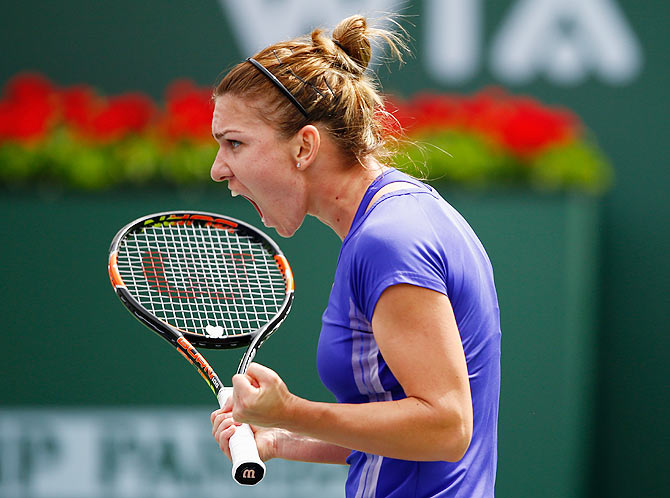 Simona Halep of Romania celebrates a point in her Indian Wells final against Jelena Jankovic of Serbia on Sunday