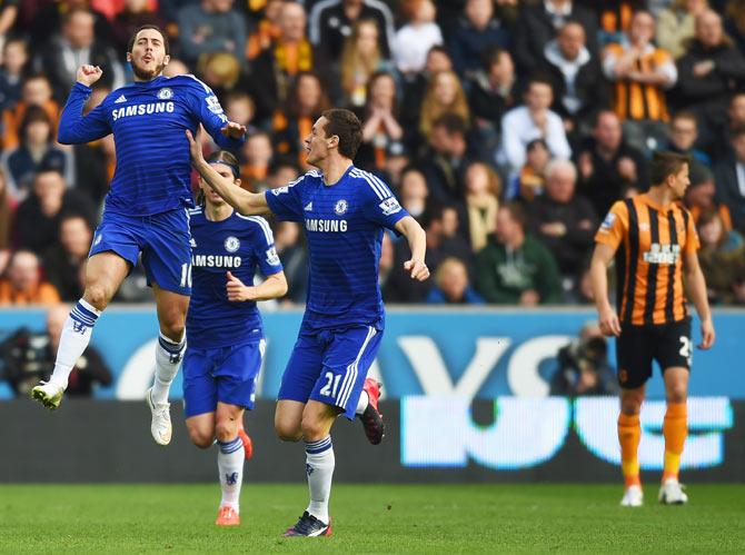 Eden Hazard of Chelsea (10) celebrates with Nemanja Matic (21) as he scores their first goal against Hull on Sunday