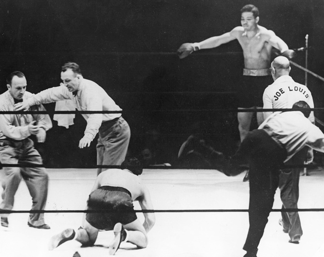  Max Schmeling the former champion (1930) is floored by Joe Louis