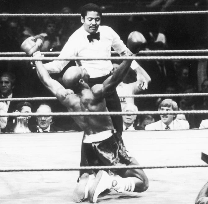 American middleweight boxer Marvin Hagler with arms raised 