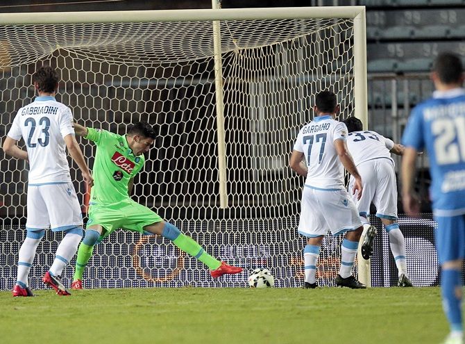 Raul Albiol of SSC Napoli scores own goal