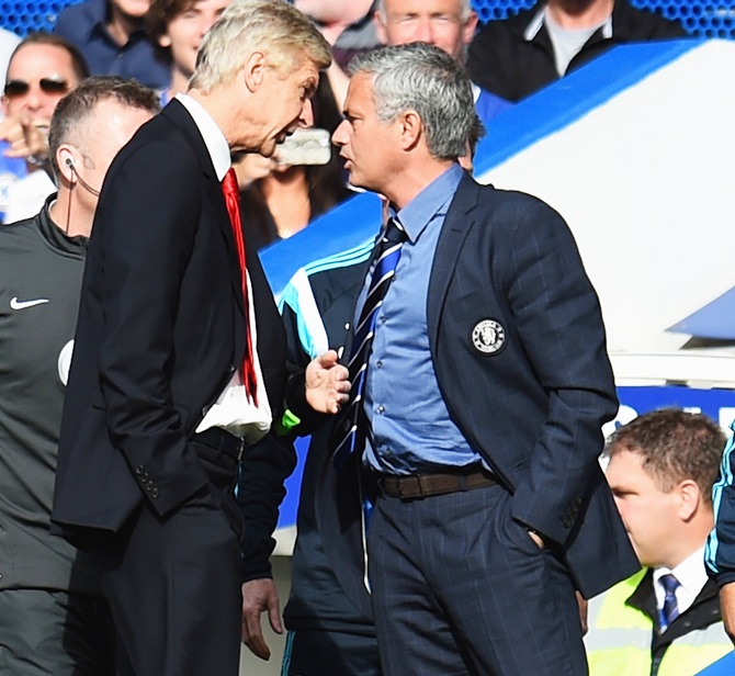 Managers Arsene Wenger of Arsenal and Jose Mourinho manager of Chelsea