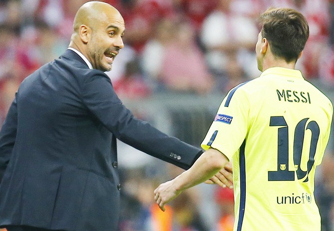 Barcelona's Lionel Messi shakes hands with Bayern Munich coach Josep Guardiola.