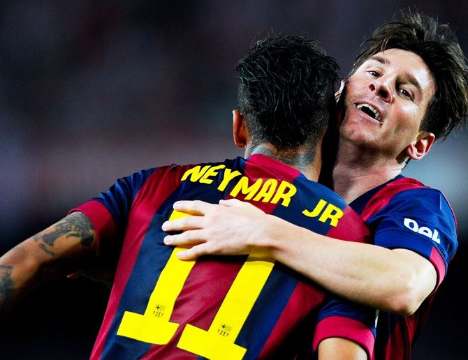 Lionel Messi of FC Barcelona celebrates with his teammate Neymar
