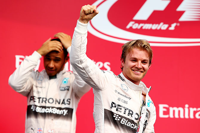 Nico Rosberg of Germany and Mercedes GP celebrates on the podium 