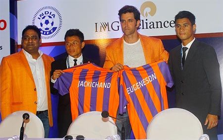 Eugeneson Lyngdoh, right, with actor and Pune City FC owner Hrithik Roshan and Jackichand Singh, second left at the ISL Player Auction
