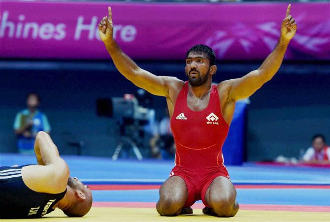 India's Yogeshwar Dutt celebrates