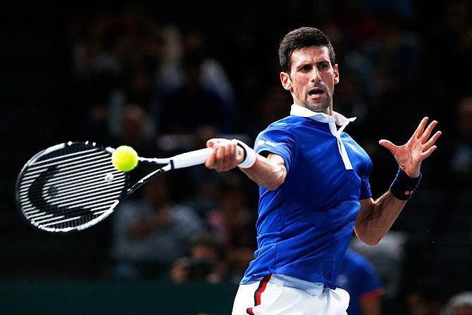 Serbia's Novak Djokovic in action against Brazil's Thomaz Bellucci during their Paris Masters round 2 match at AccorHotels Arena on Tuesday