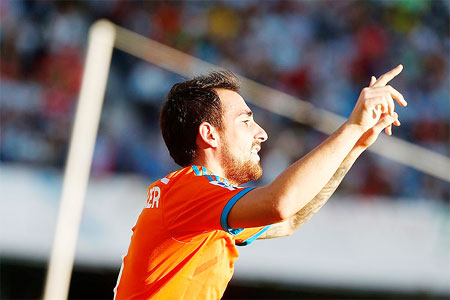 Valencia's Paco Alcacer celebrates after scoring against Celta Vigo during their La Liga match on Saturday.