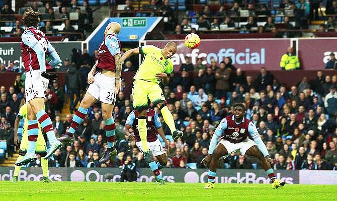 Manchester City's Fernando shoots at goal 