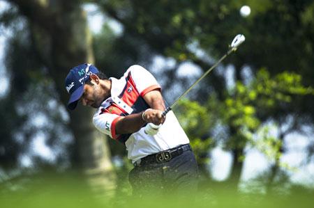 Chiragh Kumar of India tees off