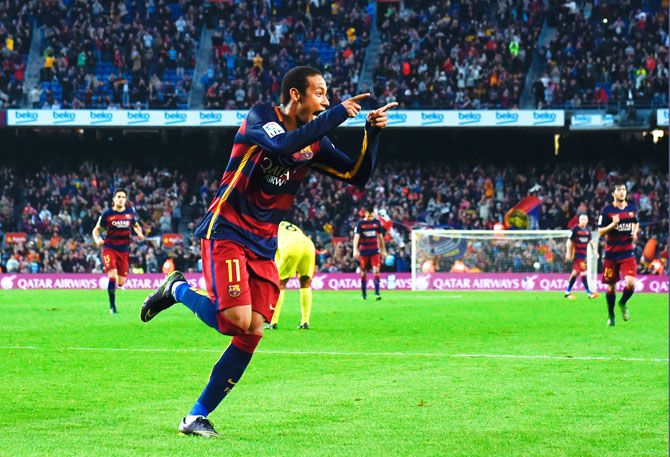 FC Barcelona's Neymar celebrates after scoring his team's third goal on Sunday
