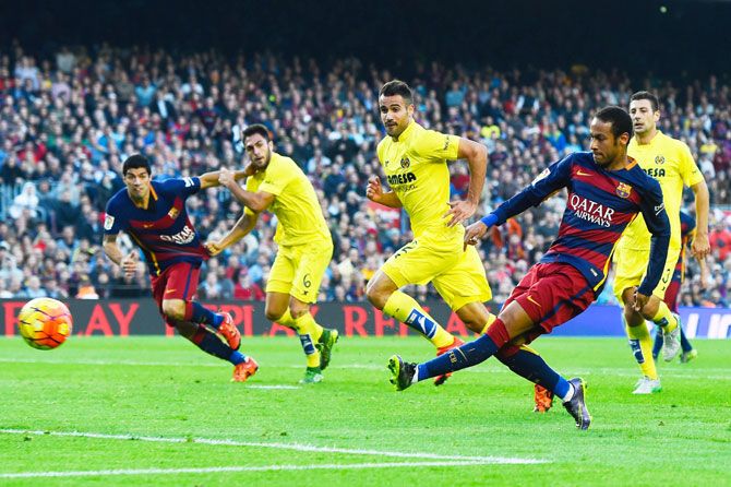 FC Barcelona's Neymar scores the opening goal during the La Liga match against Villarreal CF at Camp Nou in Barcelona on Sunday