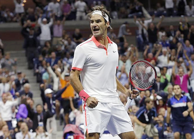 Switzerland's Roger Federer celebrates winning a point