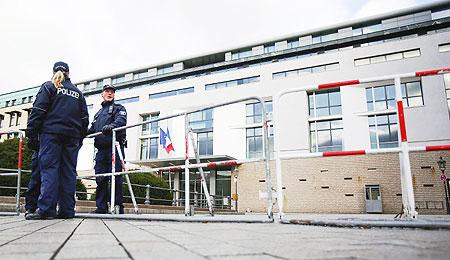 Police officers secure the French embassy in Berlin, Germany, November 14, 2015, after the attacks in Paris on Friday