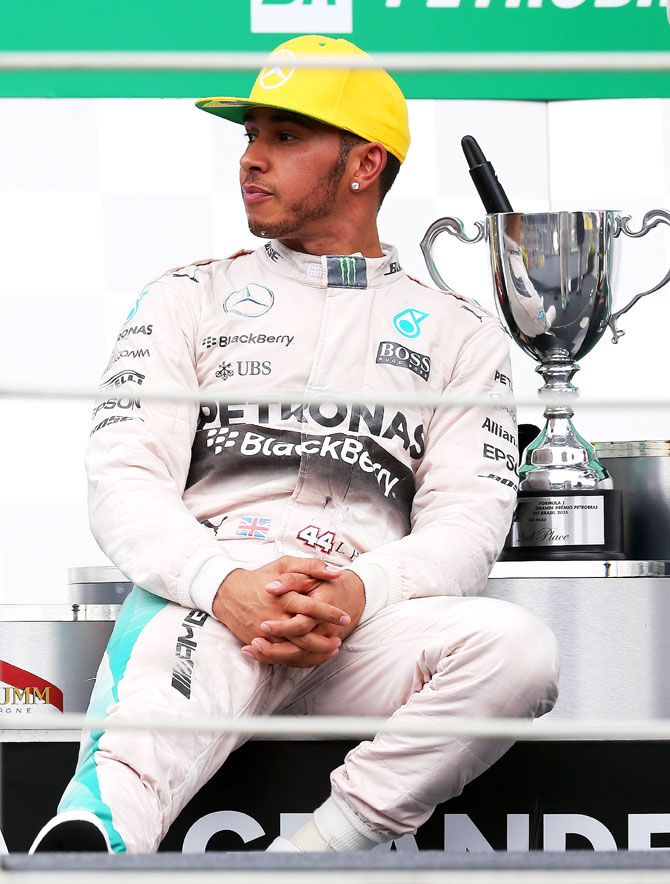 Great Britain and Mercedes GP's Lewis Hamilton on the podium after finishing second