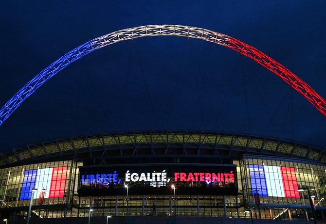 Wembley stadium is lit up in the French tricolour