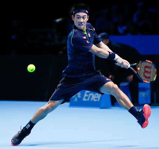 Japan's Kei Nishikori plays a backhand in his men's singles match against Czech Republic's Tomas Berdych