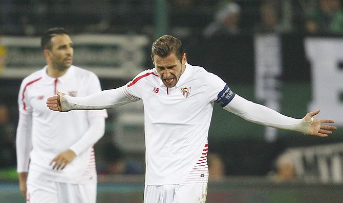 Sevilla's Adil Rami and Grzegorz Krychowiak react in frustration during their UEFA Champions League Group D match against Borussia Moenchengladbach in Borussia-Park on Wednesday