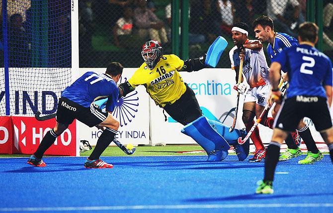 Joaquin Menini of Argentina scores against India on day one of The Hero Hockey League World Final at the Sardar Vallabh Bhai Patel International Hockey Stadium in Raipur on Friday