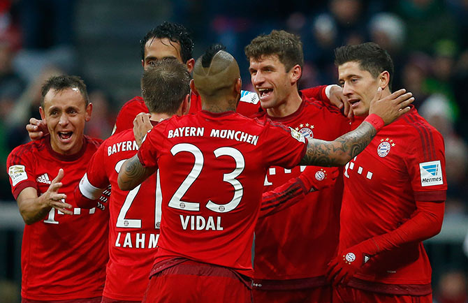 Bayern Munich's Thomas Mueller celebrates the first goal against Hertha Berlin 