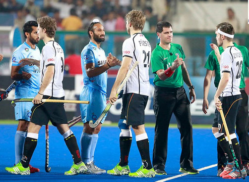 Indian and German hockey players 