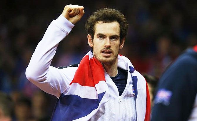 Great Britain's Andy Murray celebrates after beating Belgium's David Goffin to win the Davis Cup final in Ghent on Sunday