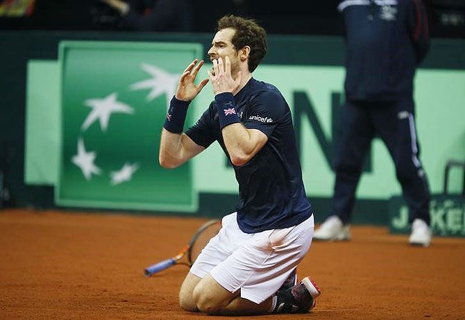 Great Britain's Andy Murray celebrates after beating Belgium's David Goffin to win the Davis Cup final in Flanders Expo, in Ghent, Belgium on Sunday