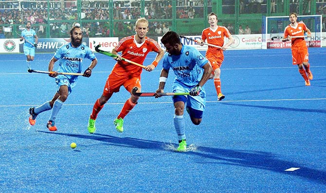 Indian and Dutch players in action during Hockey World League Final in Raipur  