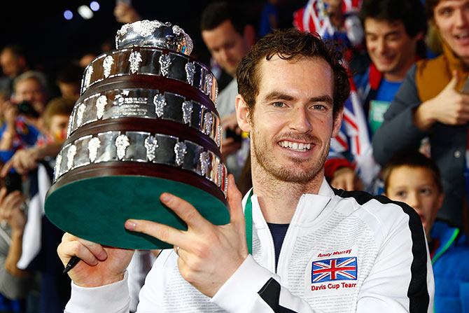Andy Murray of Great Britain poses with his trophy following victory in the Davis Cup 