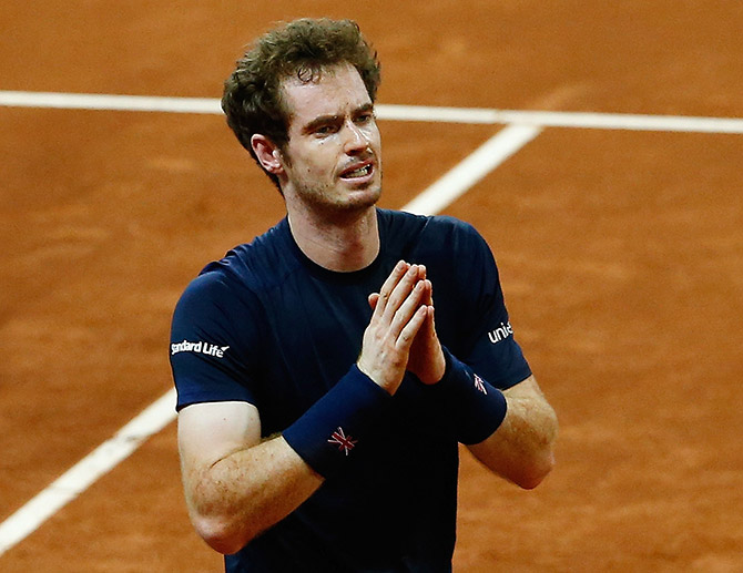 Andy Murray of Great Britain celebrates defeating David Goffin of Begium to win the Davis Cup during day three of the Davis Cup Final  