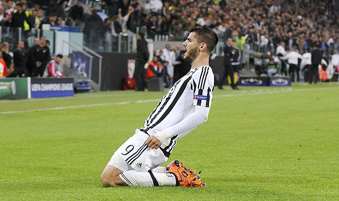 Juventus Alvaro Morata celebrates after scoring against Sevilla during their Champions League group D match at Juventus stadium in Turin on Wednesday