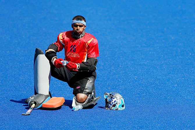 Indian hockey goalkeeper PR Sreejesh looks on during a practice session