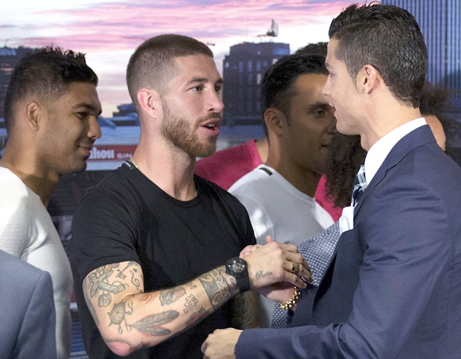 Cristiano Ronaldo, right, shakes hands with his teammate Sergio RamosCristiano Ronaldo, right, shakes hands with his teammate Sergio Ramos