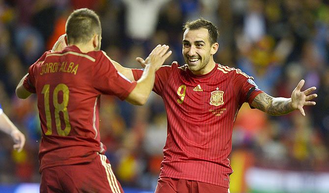 Spain's Jordi Alba (left) and Paco Alcacer celebrate a goal during their Euro 2016 Group C qualification match against Luxembourg in Logrono, Spain on Friday