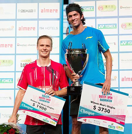 India's Ajay Jayaram (right) poses on the podium after winning the Yonex Badminton Dutch Open title after defeating Estonia's Raul Must in Almere, Netherlands on Sunday