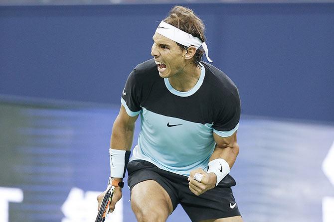 Spain's Rafael Nadal celebrates a point against Croatia's Ivo Karlovic during their second round match