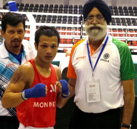 Image: Devendro Singh with Indian national boxing coach GS Sandhu (right) and assistant coach Jaidev Bisht (left)