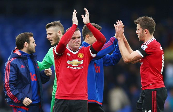 Wayne Rooney of Manchester United celebrates their 3-0 win 