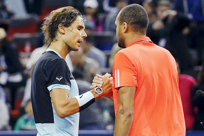 Jo-Wilfried Tsonga (right) is congratulated by Rafael Nadal