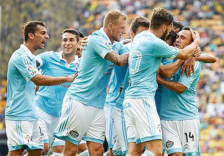 Celta Vigo players celebrate a goal during the La Liga match against Villarreal CF at El Madrigal Stadium in Villarreal on Sunday.