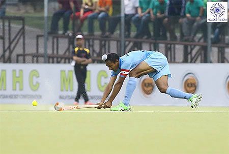 A junior India hockey player in action