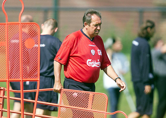 Former Liverpool boss Gerard Houllier takes part in training session