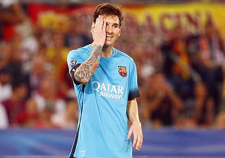 Barcelona's Lionel Messi reacts