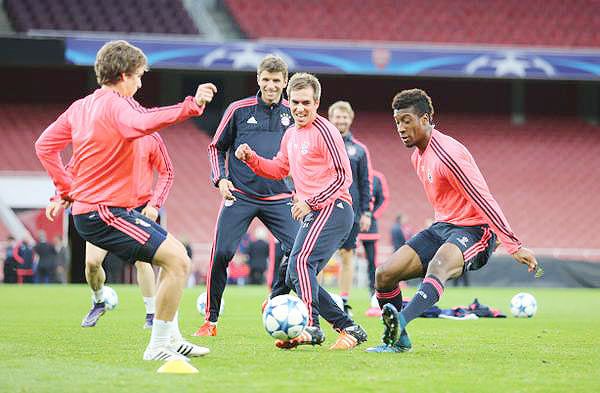 Bayern Munich players at a training session in London, on Monday, the eve of their Champions League match against Arsenal