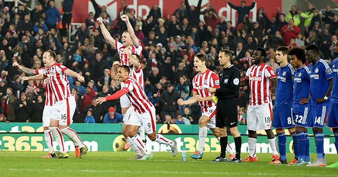 Stoke City players celebrate their win over Chelsea
