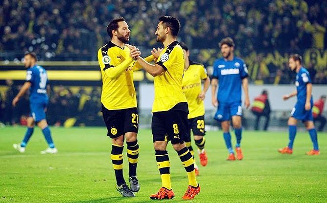  Borussia Dortmund's Ilkay Guendogan (right) and Gonzalo Castro celebrate a goal against SC Paderborn during their German Cup (DFB Pokal) second round match in Dortmund on Wednesday